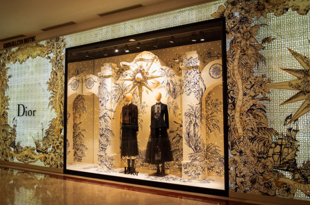 KUALA LUMPUR, MALAYSIA - DECEMBER 04, 2022: Dior brand retail shop logo signboard on the storefront...