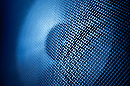 Textures of the speaker with a metal perforated grilleの写真素材