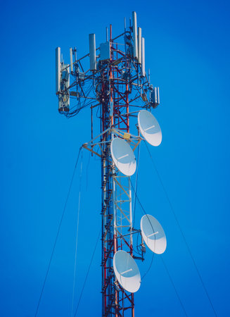 5G Cell Towers for smart mobile telephone on sky backgroundの写真素材