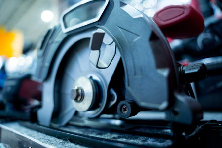 Construction carpentry electric circular saw at the showroom of a large store.の写真素材
