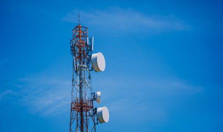 5G Cell Towers for smart mobile telephone on sky background