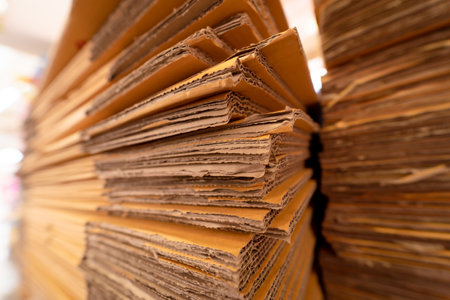 A stack of craft paper folded in a warehouseの写真素材