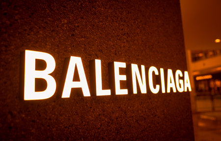 KUALA LUMPUR, MALAYSIA - DECEMBER 04, 2022: Balenciaga brand retail shop logo signboard on the storefront in the shopping mallのeditorial素材