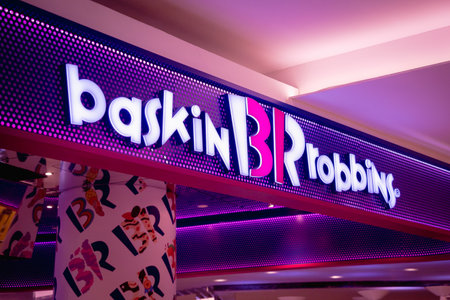 KUALA LUMPUR, MALAYSIA - DECEMBER 04, 2022: Baskin Robbins brand retail shop logo signboard on the storefront in the shopping mallのeditorial素材