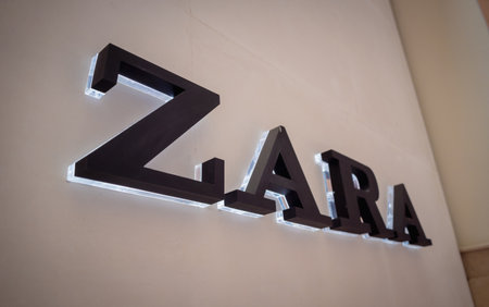 KUALA LUMPUR, MALAYSIA - DECEMBER 04, 2022: Zara brand retail shop logo signboard on the storefront in the shopping mallのeditorial素材