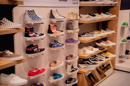 KUALA LUMPUR, MALAYSIA - DECEMBER 04, 2022: Vans brand retail shop logo signboard on the storefront...