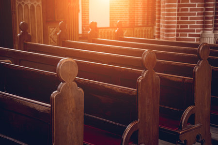 Rows of church benches at the old european catholic church.の写真素材