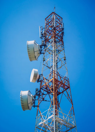 5G Cell Towers for smart mobile telephone on sky background