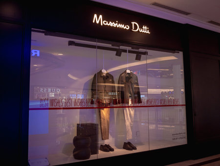 KUALA LUMPUR, MALAYSIA - DECEMBER 04, 2022: Massimo Dutti brand retail shop logo signboard on the...