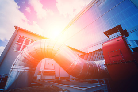 Modern steam pipeline for industrial on blue skies background.