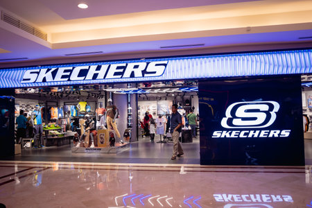 KUALA LUMPUR, MALAYSIA - DECEMBER 04, 2022: Skechers brand retail shop logo signboard on the storefront in the shopping mallのeditorial素材