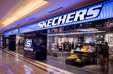 KUALA LUMPUR, MALAYSIA - DECEMBER 04, 2022: Skechers brand retail shop logo signboard on the storefront in the shopping mallのeditorial素材