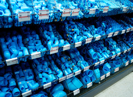 Water PVC pipes placed on the shelf in the building materials store.の写真素材