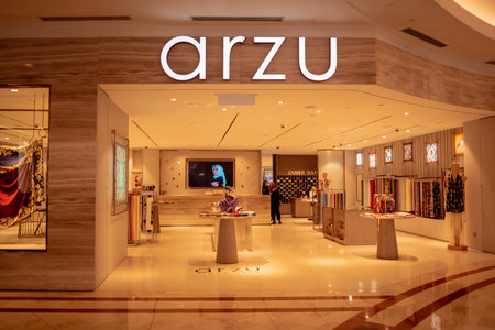 KUALA LUMPUR, MALAYSIA - DECEMBER 04, 2022: Arzu brand retail shop logo signboard on the storefront...