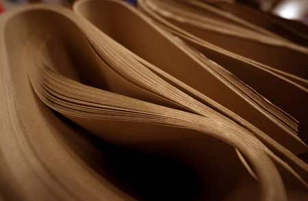 A stack of craft paper folded in a warehouseの写真素材
