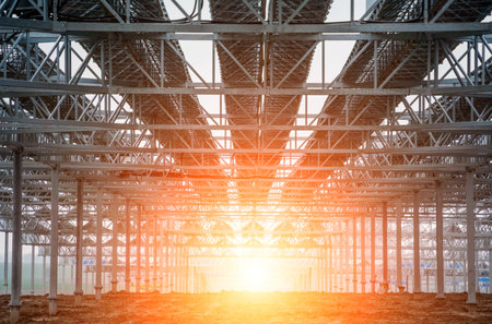 Large electrical power plant with many rows of solar photovoltaic panelsの写真素材