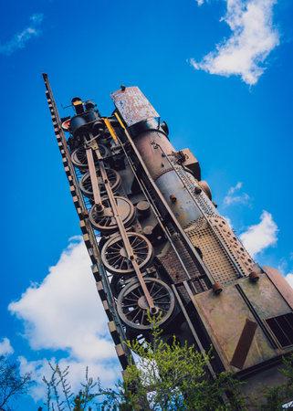 Old train high up in the sky and surfing through the clouds.の写真素材