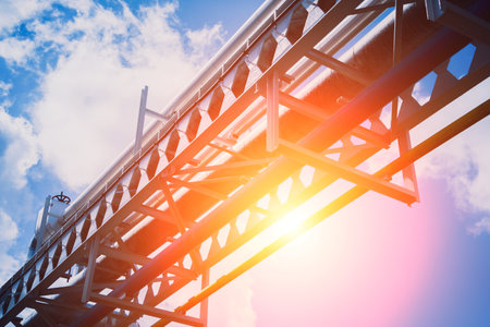 Modern steam pipeline for industrial on blue skies background.の写真素材