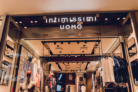 WARSAW. POLAND - MAY 21, 2023: Intimissimi uomo brand retail shop logo signboard on the storefront in the shopping mallのeditorial素材