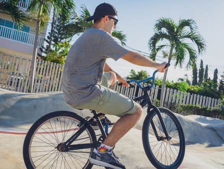 Happy young man enjoy BMX riding at the skateparkの写真素材