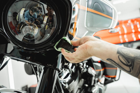 The process of nano coating motorcycle applying soft fiber spongeの写真素材