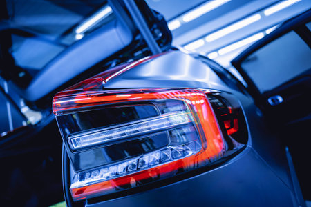 Replacing spare parts on a disassembled car in a car service garageの写真素材