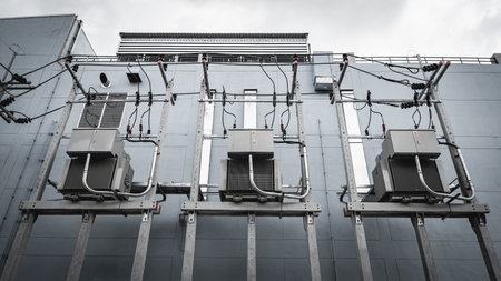Electrical power and distribution electricity system at the building wall.の写真素材
