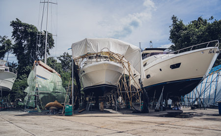 Motor yacht moored for repairs and service in dry dockの写真素材