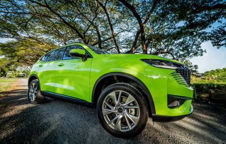 PHUKET, THAILAND- DECEMBER 25, 2023: Green GWM Haval H6 at the Thailand streets.のeditorial素材