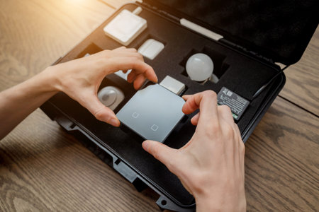 A technician works with a demo kit of the smart home system