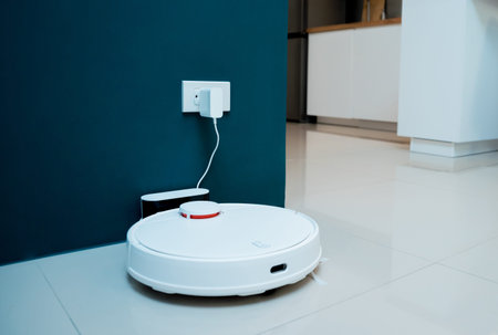 A robot vacuum cleaner at home moving towards the charging station.
