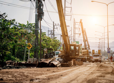 Big road construction site with special machinery in the construction areaの写真素材