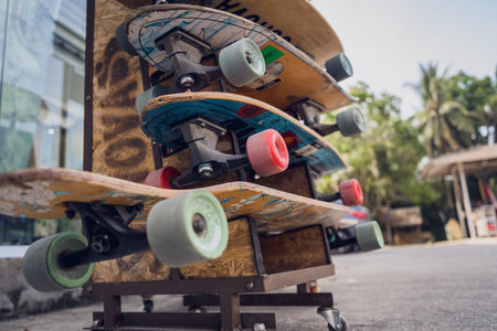 A stack of skateboards on a special outdoor stand