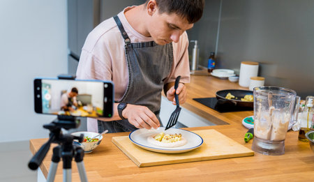 The chef is broadcasting live from workshop how to prepare a bean porridge with cauliflowerの写真素材