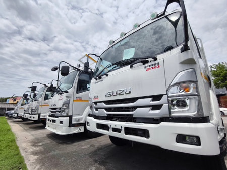 PHUKET, THAILAND - June 01, 2024: photo of the rows ISUZU trucksのeditorial素材
