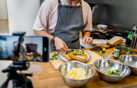 The chef is broadcasting live from workshop how to prepare a vegetarian food