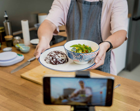The chef is broadcasting live from workshop how to prepare a vegetarian green curry