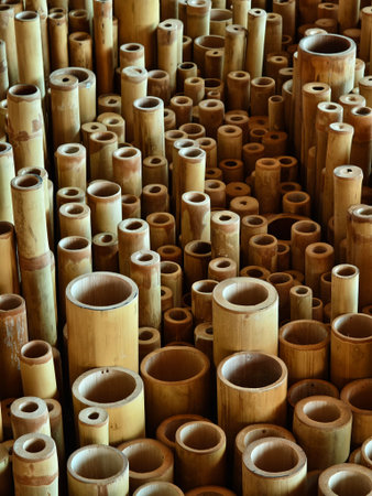 Background of bamboo tubes are arranged in a stack on top of one another