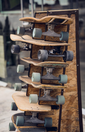 A stack of skateboards on a special outdoor stand