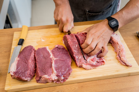 Raw fillet beef meat for steaks on the home electric grillの写真素材