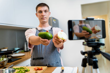 The chef is broadcasting live from workshop how to prepare a vegetarian food