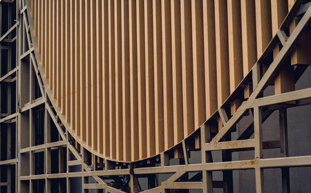 A structure featuring wooden slats on construction siteの写真素材