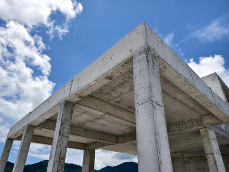 Large building with a roof pool of water under constructionの写真素材