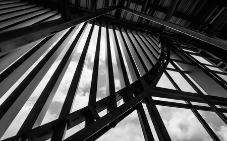 A structure featuring wooden slats on construction site contributing to its architectural styleの写真素材