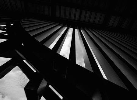 A structure featuring wooden slats contributing to its architectural styleの写真素材