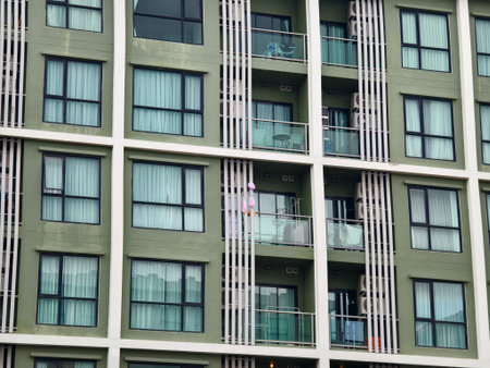 Detailed view of windows, doors and balconies of city buildings