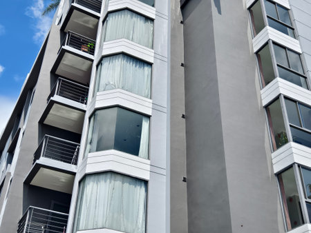 Detailed view of windows, doors and balconies of city buildings