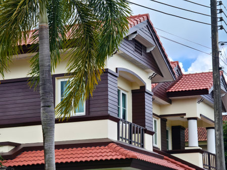Detailed view of windows, doors and balconies of city buildingsの写真素材
