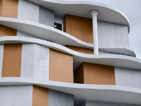 Detailed view of windows, doors and balconies of city buildingsの写真素材