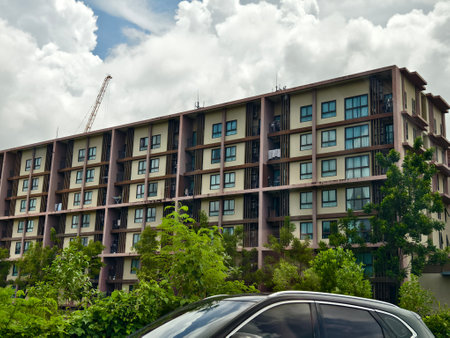 Detailed view of windows, doors and balconies of city buildingsの写真素材